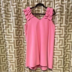 Bright pink mid length sun dress.